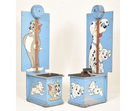Two vintage mid century 1970s faiground funfair hammer party games. One painted featuring Tom of Tom &amp; Jerry, the other f