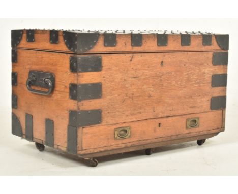 A 19th century Victorian oak and iron bound silver chest / trunk. The chest of rectangular form with hinged top opening to re