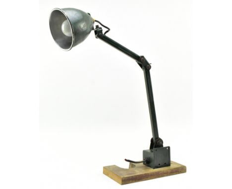 Memlite - a retro 1950s industrial factory work mountable desk / machinist's lamp light. The lamp having a conical green shad