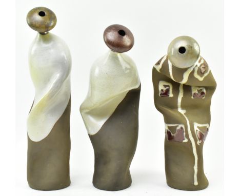 Perrozo Cantabria - three vintage 20th century unusual studio pottery partially glazed twisted &amp; dimpled ceramic bottles.