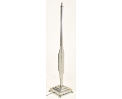 An early 20th century 1920s - 1930s Art Deco chrome standard floor lamp. The standing lamp featuring fitting over squared col
