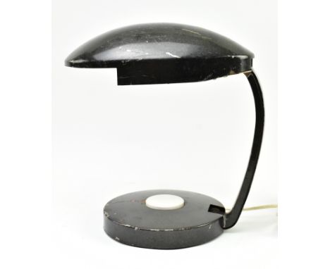 A retro 1960s space-age table / desk lamp light in the manner of Bauhaus. The lamp of metal construction having a UFO shaped 