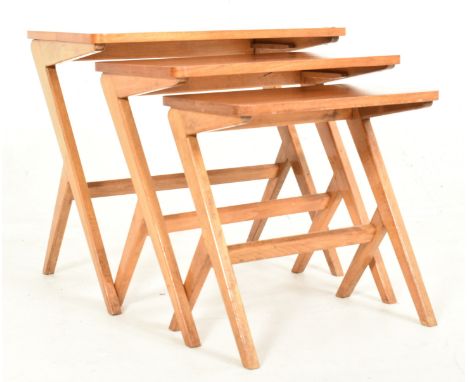 Bengt Ruda for Nordiska Kompaniet - a vintage mid century Swedish Scandinavian nest of three oak 'walking' side tables. The n
