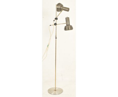 A retro 20th century Danish design 1970s floor standing lamp light. The lamp having twin adjustable spotlights with aluminum 