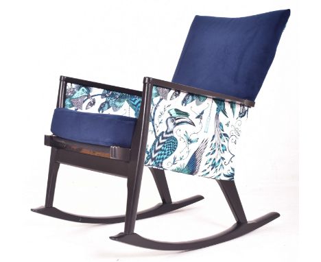 Parker Knoll - a retro mid 20th century circa 1970s ebonised teak &amp; newly upholstered easy lounge rocking armchair. The c