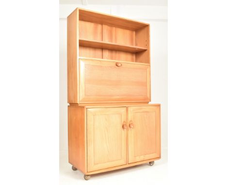 Ercol - Windsor Range - a vintage 20th century blonde elm highboard bureau bookcase. The display / cocktail cabinet featuring