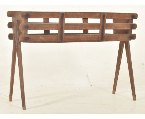 A vintage mid 20th century teak planter / plant stand. The planter having a rectangular slatted top over tapering splayed leg
