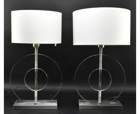 Baulmann Leuchten - a pair of vintage modernist high end designer acrylic and chrome ring shaped bedside table lamps. Each la
