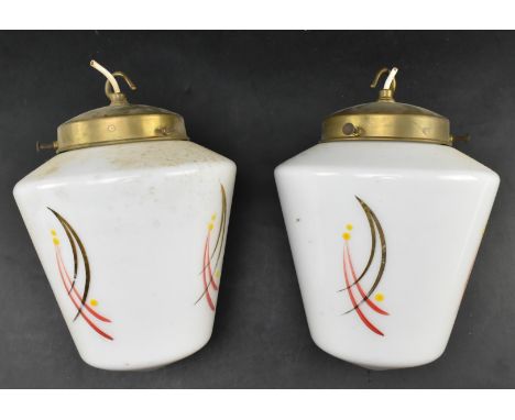 A pair of vintage mid century opaline milk glass pendant ceiling lights. Each ceiling light with brass fitting, of tapering c