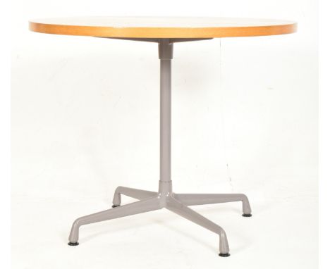 Charles and Ray Eames for Vitra - a vintage mid century oak contract dining table. The table with heavy oak surface raised ov