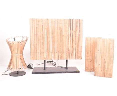Four vintage mid century 1970s style bamboo reed effect light shades. Each light shade of varying form, the largest rectangul