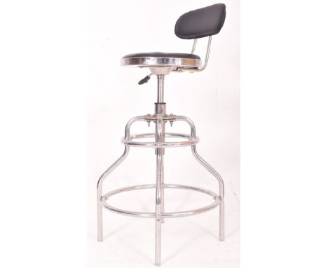 A vintage mid century circa 1970s chrome &amp; leatherette barbers chair. The stool high &amp; with leatherette back and seat