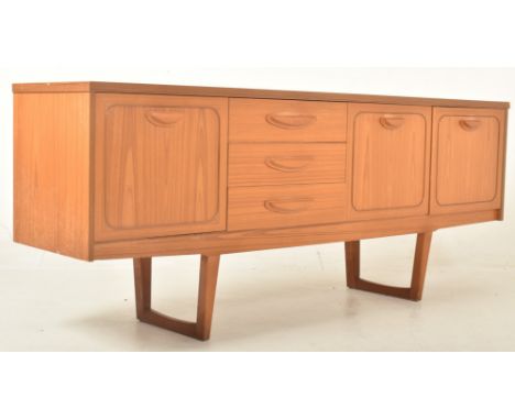 Stonehill Furniture - a vintage mid 20th century teak veneered sideboard. The sideboard featuring three central drawers flank
