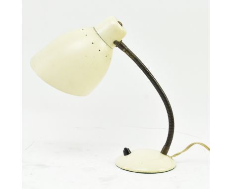 A vintage mid century circa 1970s cream enamel gooseneck articulated desk lamp. The lamp light featuring conical curved shade