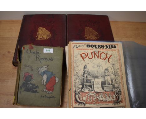 A vintage copy of Joel Chandler Harris 'Uncle Remus' and a small selection of Punch magazines and books.