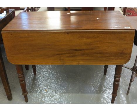 Victorian mahogany Pembroke table on ring turned supports.(B.P. 24% incl. VAT)