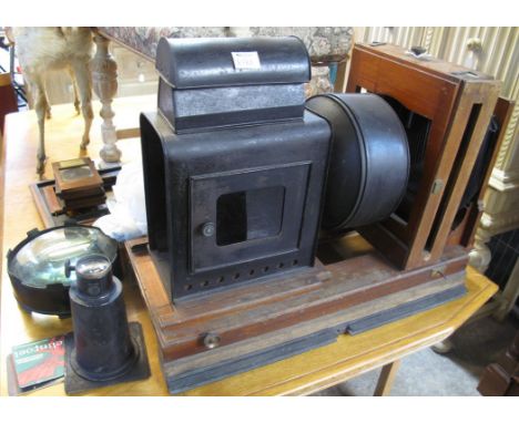 Late 19th/early 20th Century magic lantern projector having 'Grosvenor Enlarger' with lens. Together with large convex lens, 