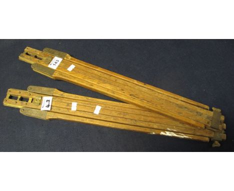 Pair of vintage wooden and brass mounted folding  tripod legs. (2)(B.P. 24% incl. VAT)