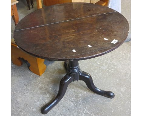 19th Century oak tilt top tripod table. (B.P. 24% incl. VAT)