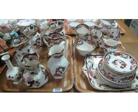 Two trays of Masons Mandalay design ironstone items to include; pouch shaped dresser jugs, specimen vase, cups and saucers et