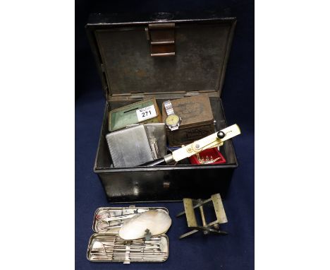 Dome topped tin box comprising various oddments including: silver plated cigarette cases; lighters; vintage tin boxes; pens; 