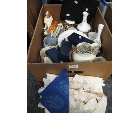 Box of assorted items to include; a small collection of table linen, mainly embroidered placemats, boxed community plate knif