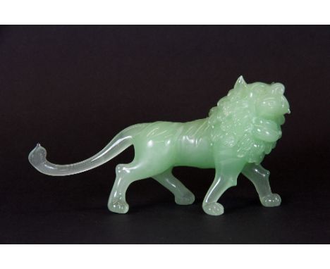 A lovely 19th/early 20thC Peking glass lion imitating jade (13cm x 6.5cm)