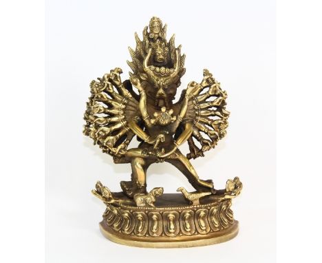 A Tibetan gilt bronze figure of a tantric deity (H:17.5cm)