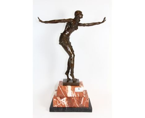 A large art deco style bronze figure of a dancer mounted on a marble base (H:48cm)