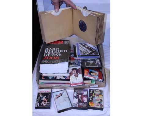A job lot of vintage 7" singles, cassettes and books etc 