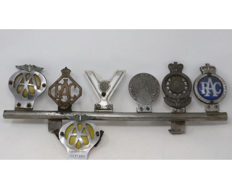 Vehicle badge bar with six badges including three RAC, Veteran Motorist 24, AA and a further AA badge. UK P&amp;P Group 3 (£3