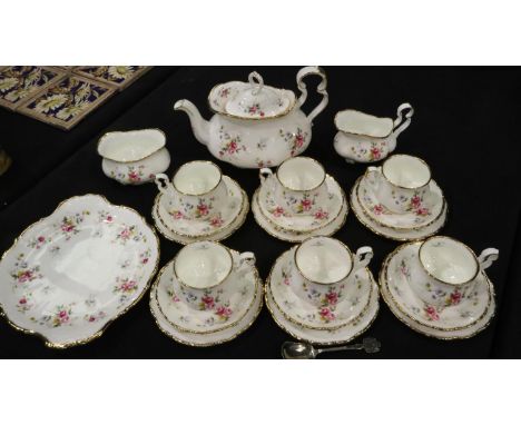 Royal Albert tea service of twenty two pieces in The Tenderness pattern, no chips cracks or visible damages, slight wear to g