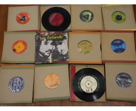 100 mixed singles, mainly Rock. UK P&amp;P Group 2 (£20+VAT for the first lot and £4+VAT for subsequent lots) 