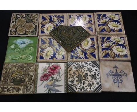 Twelve Victorian tiles and a part tile, in mixed condition, each 15 x 15 cm. UK P&amp;P Group 3 (£30+VAT for the first lot an