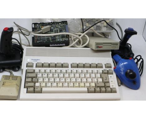 Mixed Commodore spares and after market accessories. All electrical items in this lot have been PAT tested for safety and hav