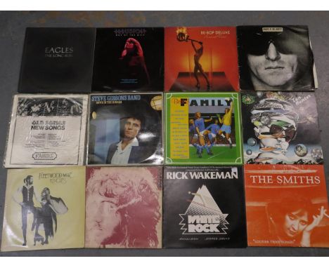Twelve rock albums including Ian Hunter and Family. UK P&amp;P Group 2 (£20+VAT for the first lot and £4+VAT for subsequent l