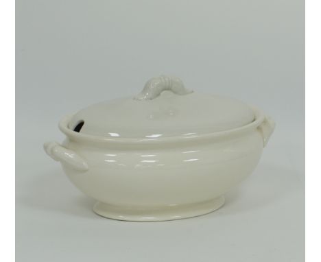 An oval porcelain soup tureen and matched cover W36cm, D23cm, H18cm, glazed in ivory. The cover marked R.A.F. A.J. Wilkinson 