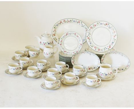A Royal Doulton Expressions - FLORENTINA porcelain dinner and tea service, decorated with delicate flowers within green borde