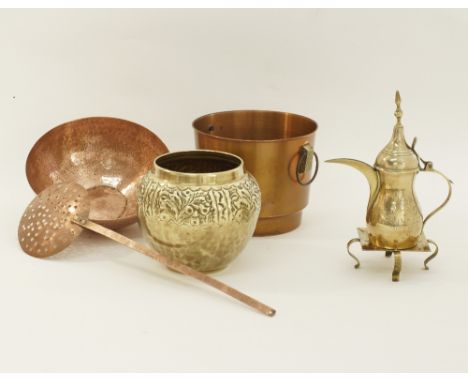 A collection of vintage copper and brass ware comprising of a wine bottle chiller with handles, a hammered bowl, a brass plan