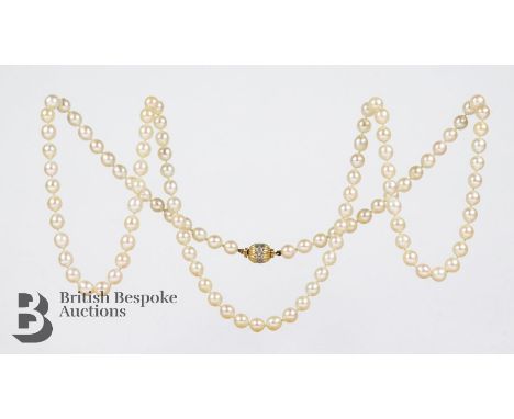 Stunning cultured pearl baroque necklace, held by an 18ct gold and diamond clasp set with approx 14 pts of eight-cut dias, ap