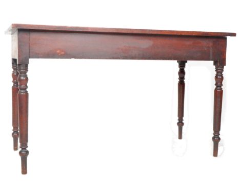 An early 19th Century George III mahogany long writing table desk or hall console table / server. Comprising a rectangular fl