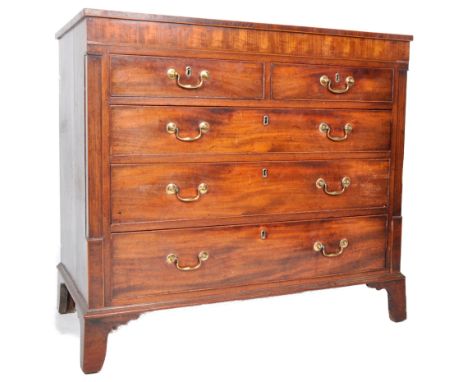A 19th Century mahogany caddy top chest of drawers. The bank of two over three chest of drawers having a gentle flared pedime