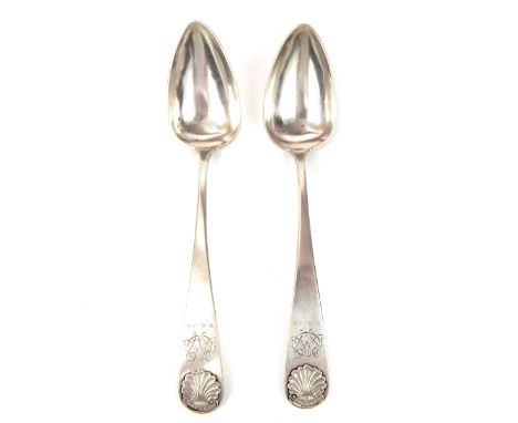 A pair of  mid 19th century white metal serving spoons, marked and dated Prove, CU 1867 on the stem, with later engraved mono