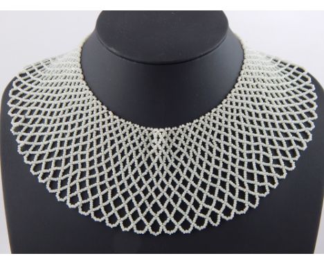 Bead Collar, expanding lattice decoration, 12.5cm gap at neck, and coral necklaces and brooch (4)