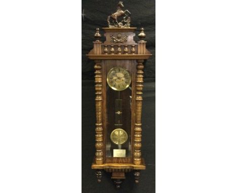 A 19th century Vienna wall clock, brass dial inscribed with Roman numerals, twin winding holes, 8 day movement, 145cm high, c