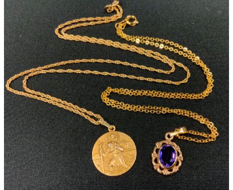 A 9ct gold St Christopher pedant necklace, 5.4g gross;  a 9ct gold amethyst pendant, gold plated chain, 3.4g gross (2) 