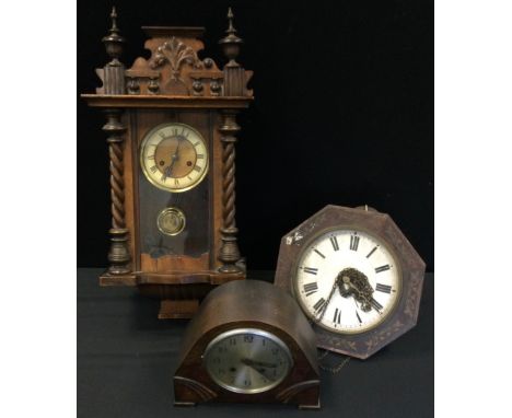 A 19th century Vienna wall clock, the dial with Roman numerals, 60cm high, c.1890;  an oak mantel clock, c.1930;  a German wa