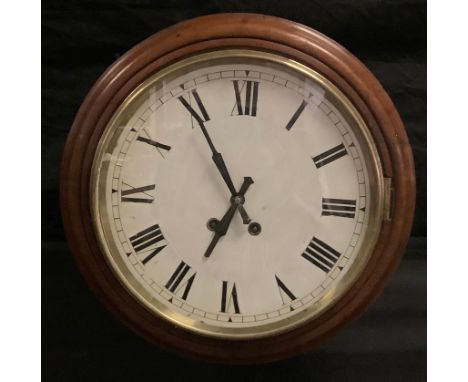 A 19th century mahogany cased school clock, round dial, Roman numerals, twin winding holes, 40cm diameter. 