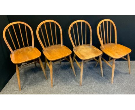 A set of four Ercol style kitchen Windsor chairs, model 139
