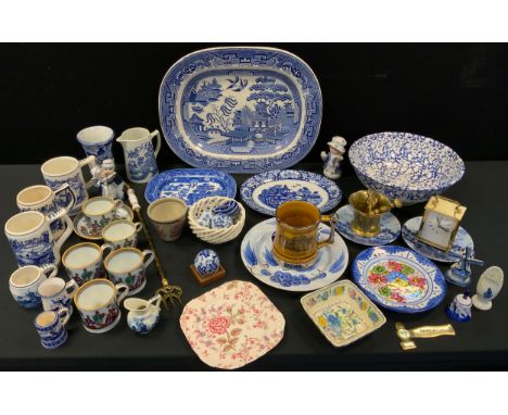 A Willow pattern meat plate;  Dutch Delft mugs, bells, etc;  commemorative mugs;  carriage clock;  brass mortar;  etc 
